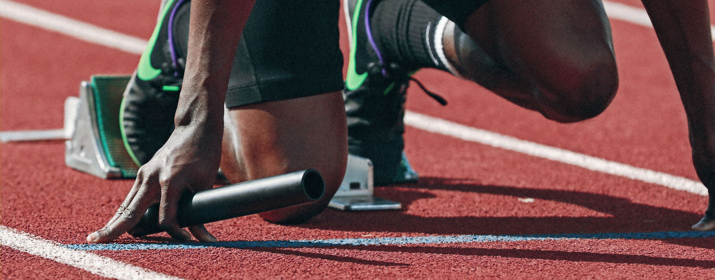 Sportchiropraktik München – Athlet am Startblock, Leistung optimieren